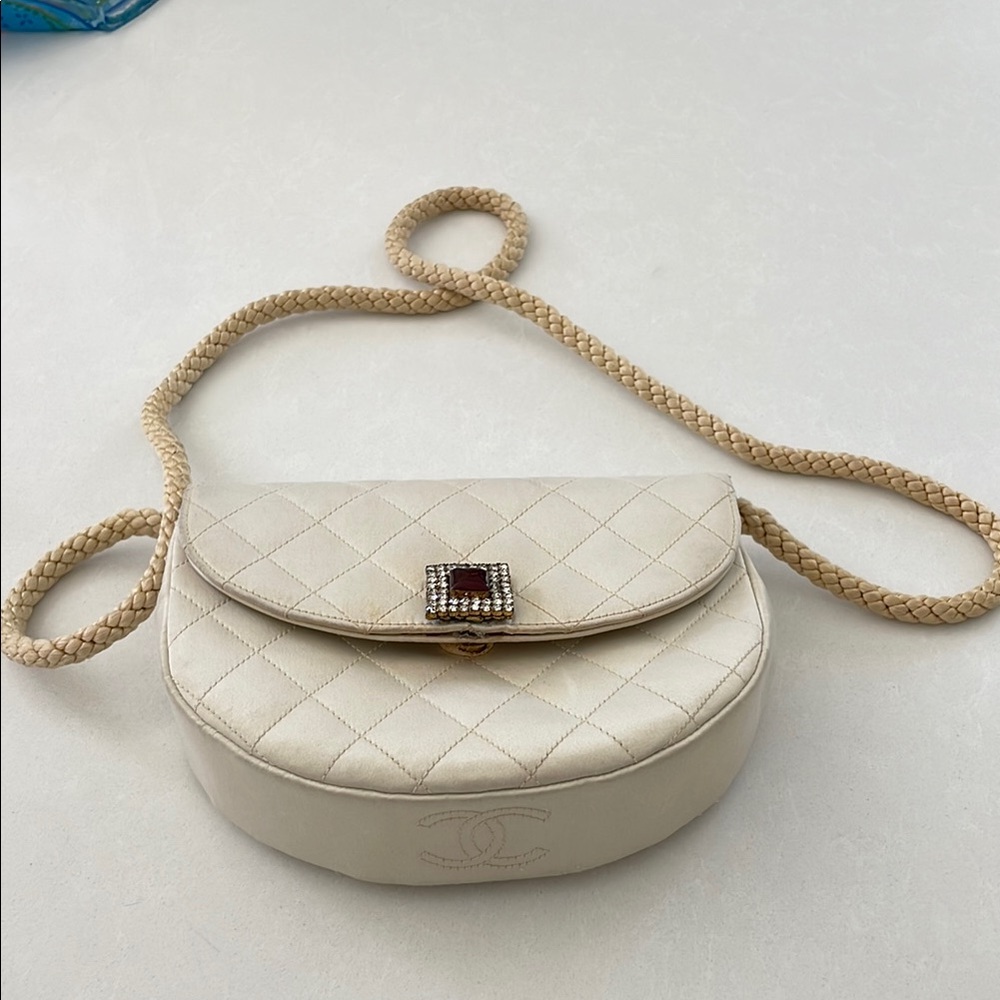 CHANEL Cream Quilted Clutch with Gold Accents